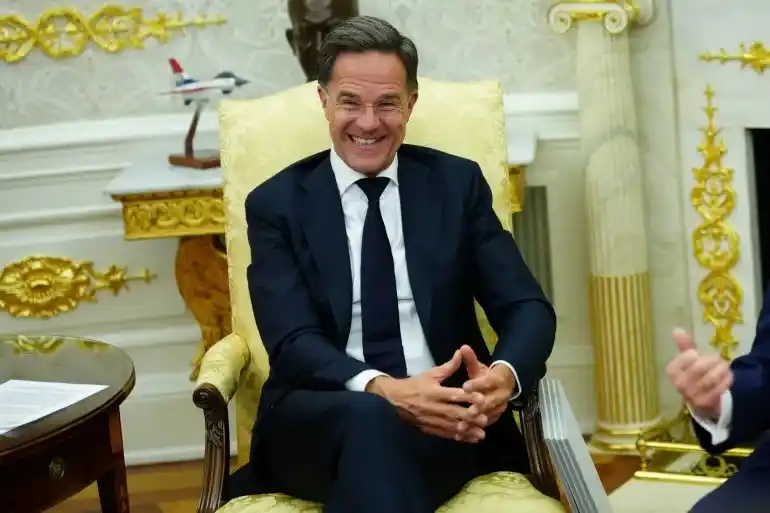 Trump Criticizes NATO Allies Over Iran as Mark Rutte Seeks to Ease Tensions /images/trump-nato-mark-rutte-iran-white-house-2026.webp